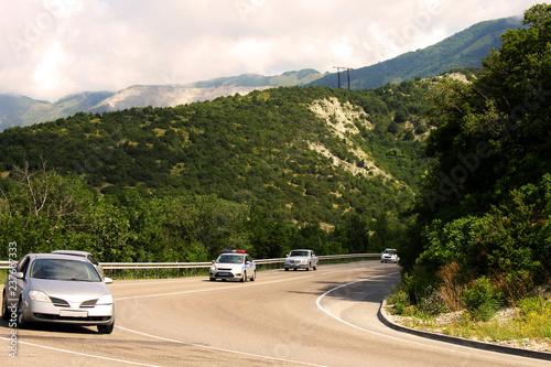 Mountain road with cars