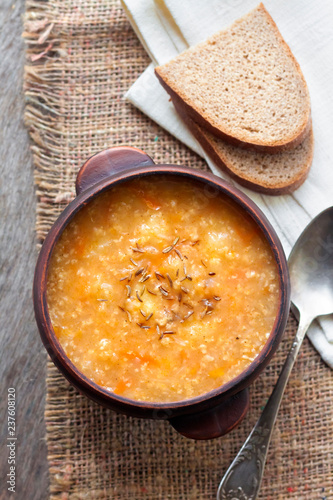 Kapustnyak - traditional ukrainian winter soup with sauerkraut, millet and meat