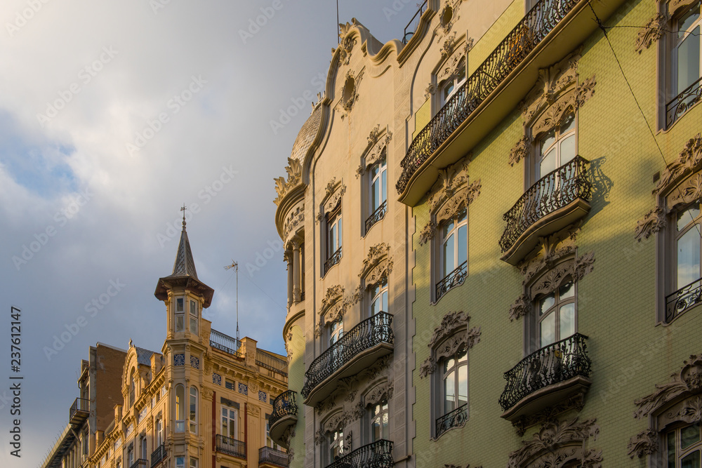 historic facades in the carrer de la pau in Valencia, Spain