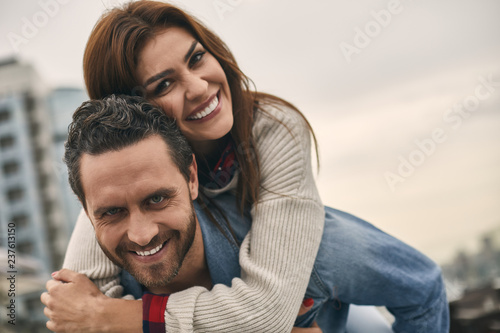 Smiling man and woman are locating outdoor © Yakobchuk Olena