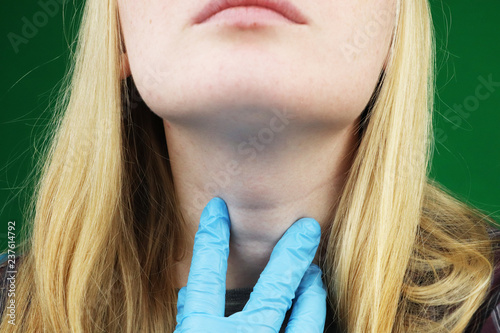 The girl on examination at the doctor. Thyroid photo