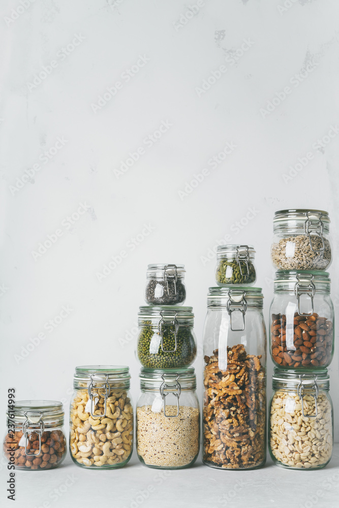 Glass jars with Superfoods stacked on top of each other Glass jars with Superfoods stacked on top of each other