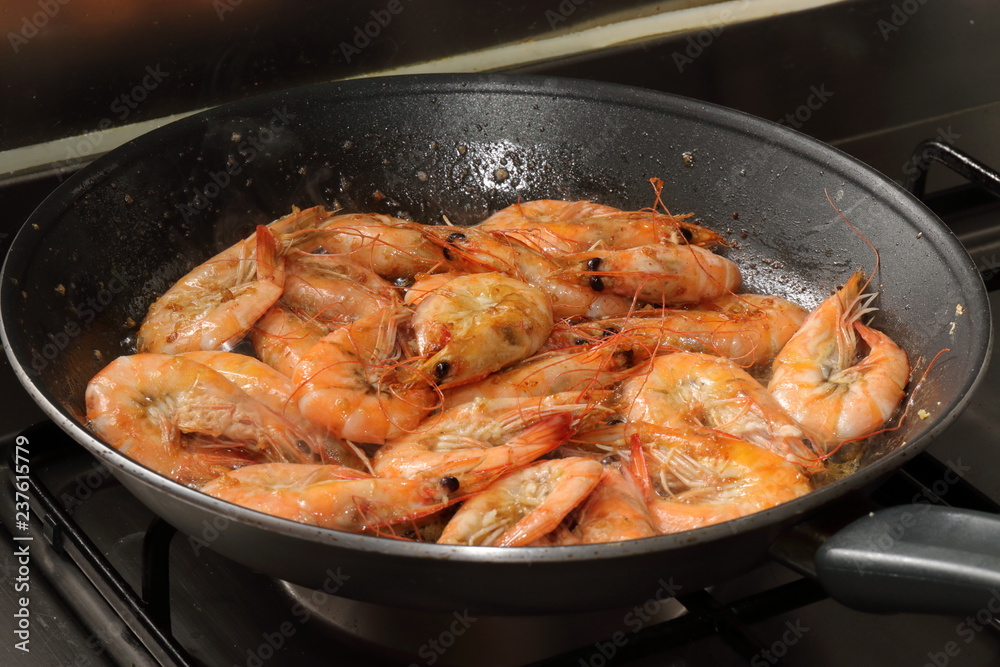 frying pan with shrimps frying pan with shrimps