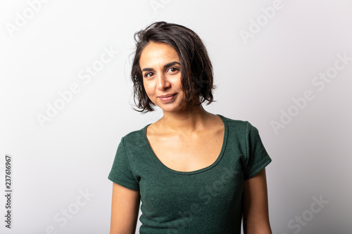 bright brunette girl isolated on a white background
