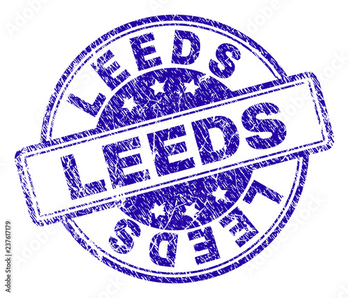 LEEDS stamp seal imprint with distress texture. Designed with rounded rectangles and circles. Blue vector rubber print of LEEDS label with unclean texture.
