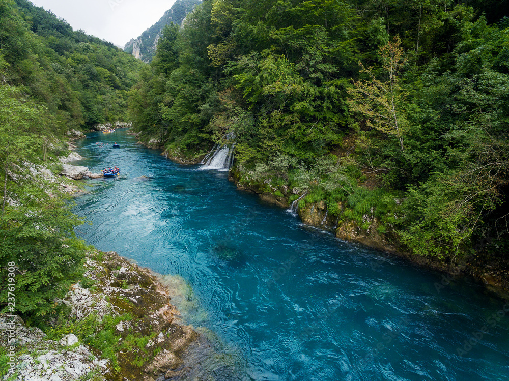 Drone image of beautiful blue clear river in a forest Drone image of beautiful blue clear river in a forest