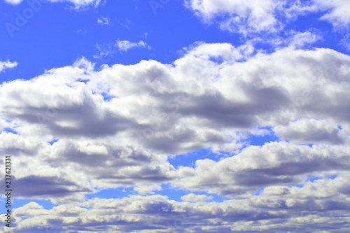 Beautiful blue sky and white stratocumulus clouds. Background. Landscape. photo