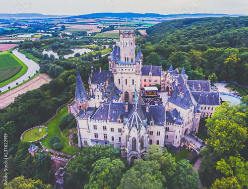 View of Marienburg Castle, a Gothic revival castle in Lower Saxony, Germany, near Hanover, drone aerial view photo