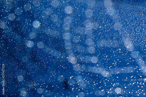 Cobweb with raindrops. Close-up. Blurred focus