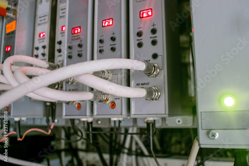 Vászonkép Coaxial television cables connect to TV signal receivers