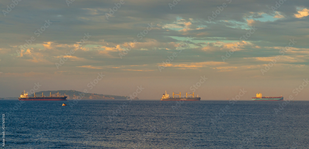 sunset on the sea and ships