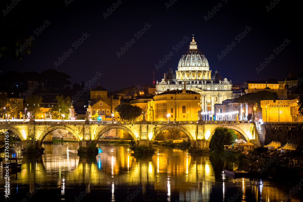 Fototapeta premium Vatican City: Saint Peter with bridge reflection by night
