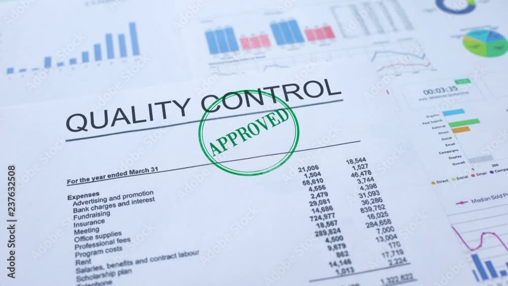 Quality control approved, hand stamping seal on official document, statistics