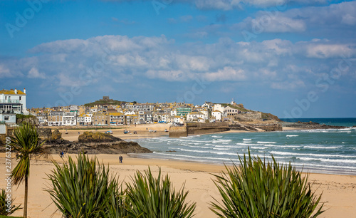 Harbour at St Ives with waves crashing against the harbour wall taken in St Ives, Cornwall, UK on 28 February 2016