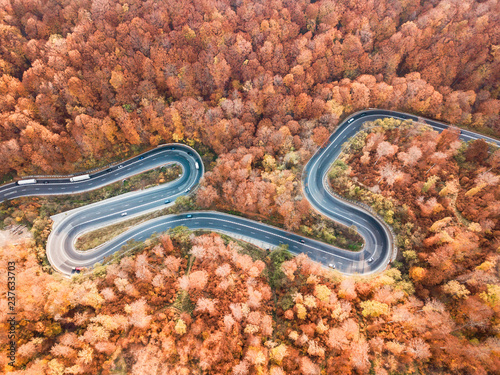 Winding road from high mountain pass, in autumn season. Aerial view by drone. Romania © Rafaila Gheorghita