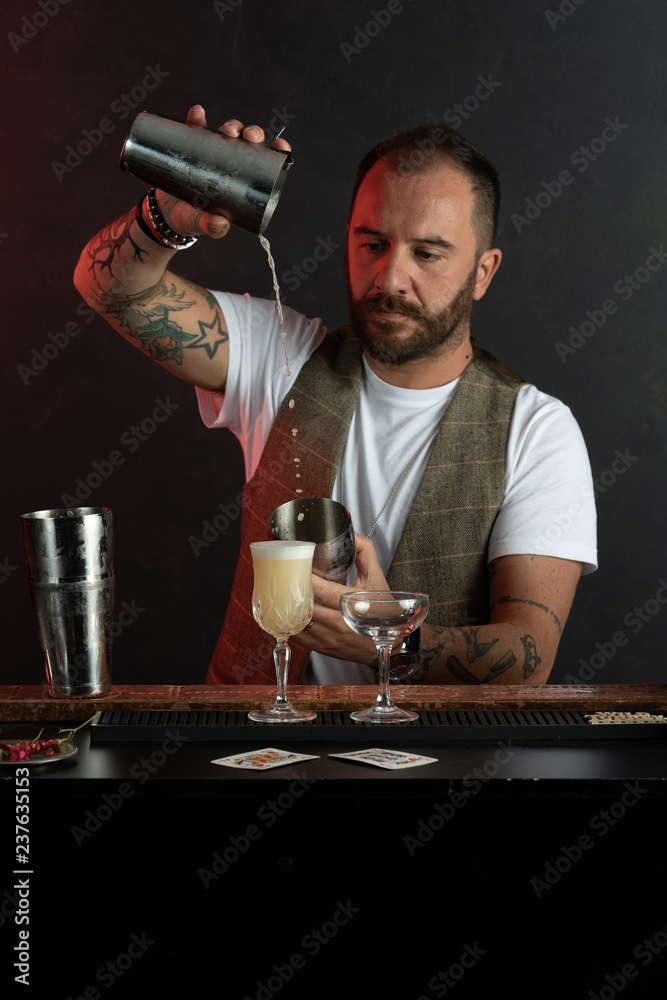 Professional barista prepares cocktails