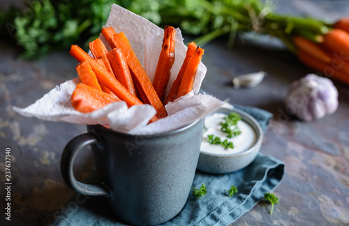 Carrot fries with sour cream and garlic dip