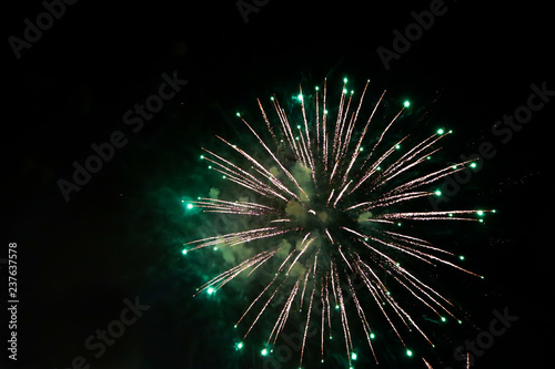 Colorful fireworks over dark sky  New Year celebration fireworks
