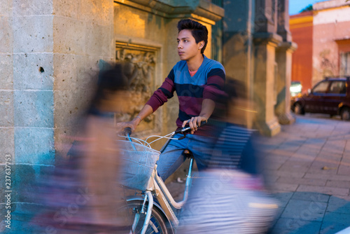 Young man on a bike in the city
