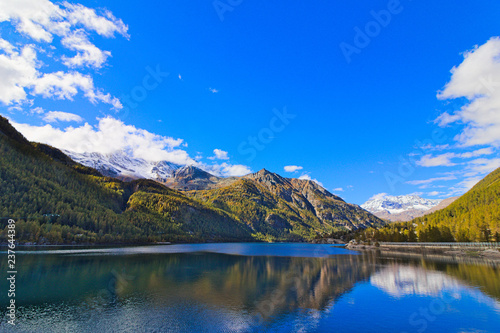 Lake of Ceresole Reale, near the Nivolet pass, clear autumn morning, blue sky, Piedmont, Italy © Marco