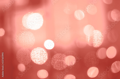 Living Coral glitter bokeh background. Color of the year 2019. Main trend concept. Natural and authentic mood.