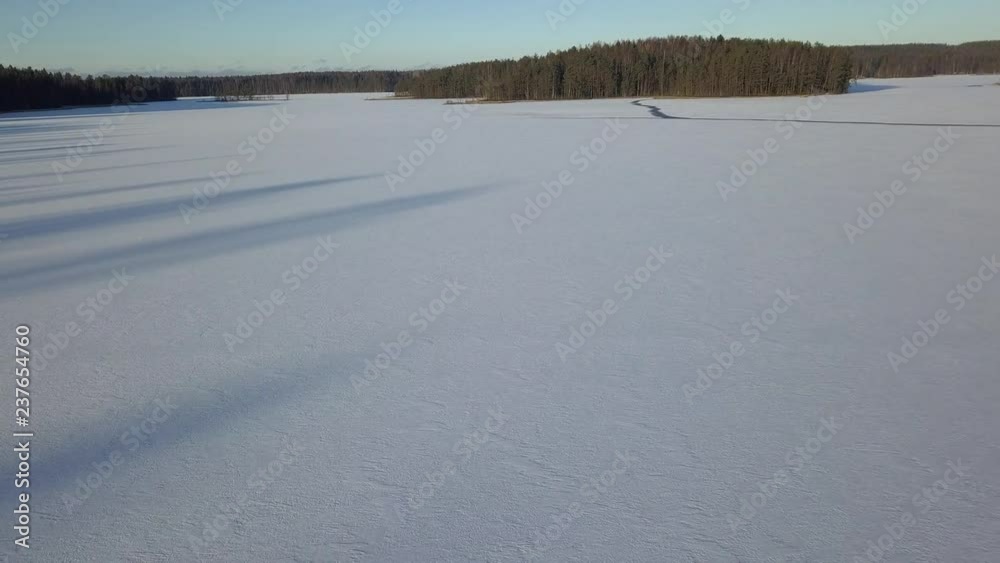 Flying over a winter lake in Karelia Flying over a winter lake in Karelia