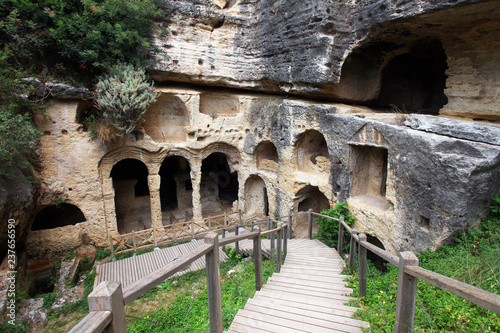 Besikli Cave tomb monument in Antakya (Hatay) Turkey. In tombs, 12 rock tombs are found which belongs to Roman. photo