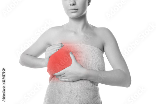 Woman doing breast self-examination on white background. Cancer awareness