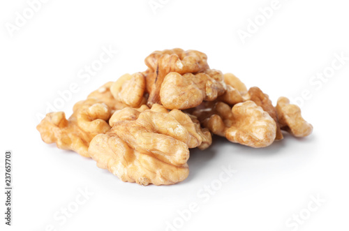 Heap of tasty walnuts on white background