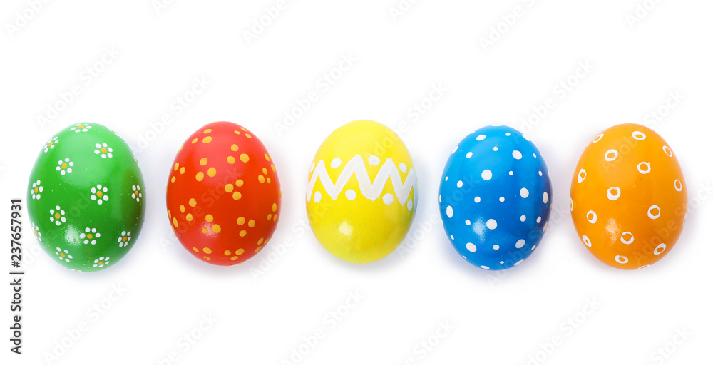 Decorated Easter eggs on white background, top view. Festive tradition
