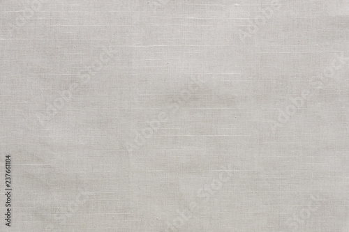 Texture of the white linen fabric. Blank fabric background.