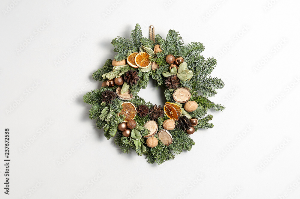 Rustic Christmas wreath on a gray background