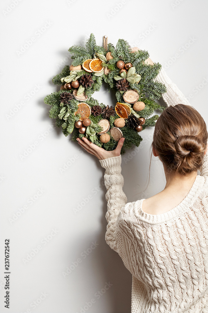 Rustic Christmas wreath on a gray background
