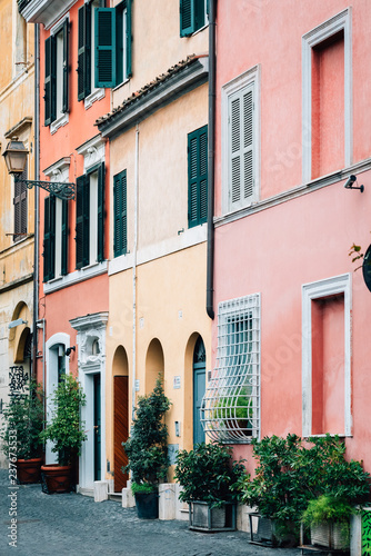 Pastel houses in Trastevere, Rome, Italy © jonbilous