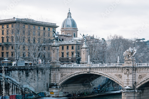 Ponte Vittorio Emanuele II in the snow, in Rome, Italy