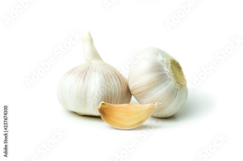 Isolated Garlic (Allium sativum) has many medicinal properties and can be used for ingredient food. on white background and clipping path.