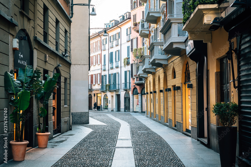 Obraz premium A colorful cobblestone street in Brera, Milan, Italy.
