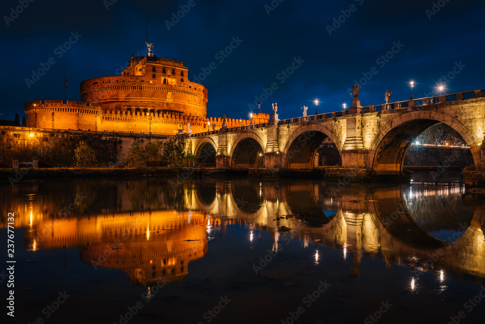 Castel Sant'Angelo and Ponte Sant'Angelo at night, in Rome, Italy.