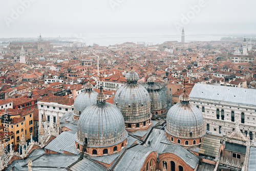 View of Saint Mark's Basilica from the Campanile in Venice, Italy © jonbilous