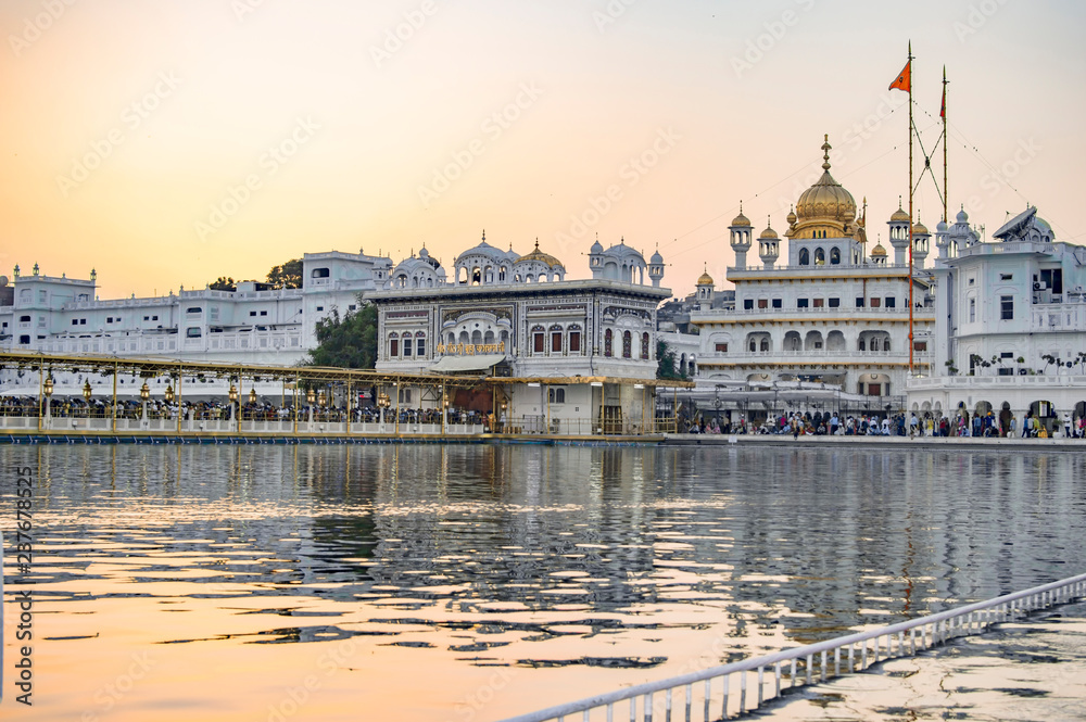 Calm lake of golden temple with early morning view