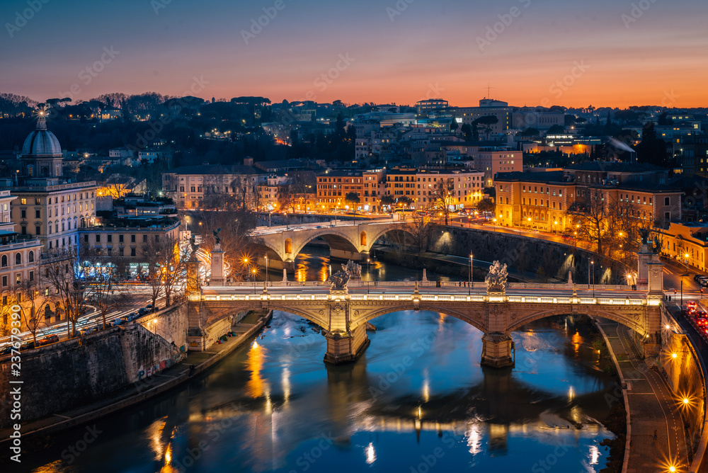 View of the River Tiber at night from Castel Sant'Angelo, in Rome, Italy