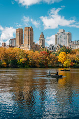 Buildings in the Upper West Side and autumn color along The Lake, in Manhattan, New York City
