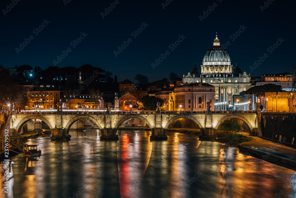 Ponte Sant'Angelo and St. Peter's Basilica, in Rome, Italy.
