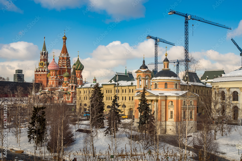 Moscow Kremlin. View of  Spasskaya tower and St. Basil's cathedral from Zaryadye Park