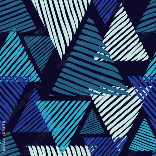 Trendy seamless pattern designs. Figures from striped triangles. Vector geometric background. Mosaic texture. Can be used for wallpaper, textile, invitation card, wrapping, web page background.