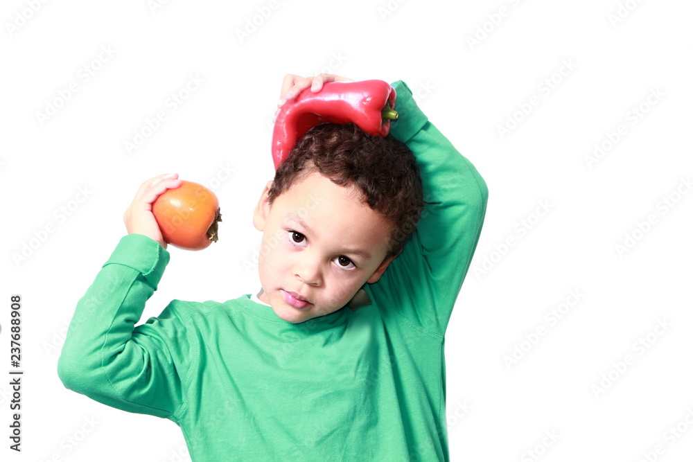 little boy holding fresh fruits promoting healthy eating little boy holding fresh fruits promoting healthy eating