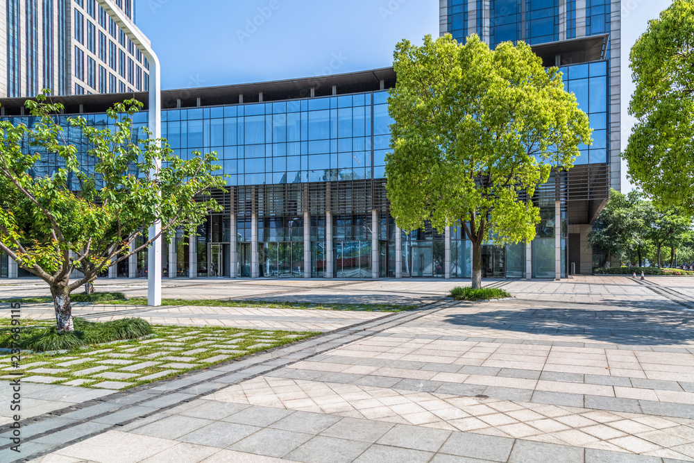 modern office buildings and empty pavement in china. modern office buildings and empty pavement in china.