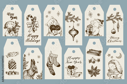 Christmas gift cards or tags with lettering. Hand drawn design elements. Vector. Bear, candy, kitten with heart, Christmas toys, pig, gifts, squirrel, socks, spice, bunny