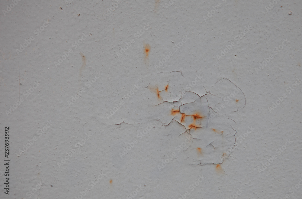 Texture background.Carcked paint on a metal wall with rust Texture background.Carcked paint on a metal wall with rust