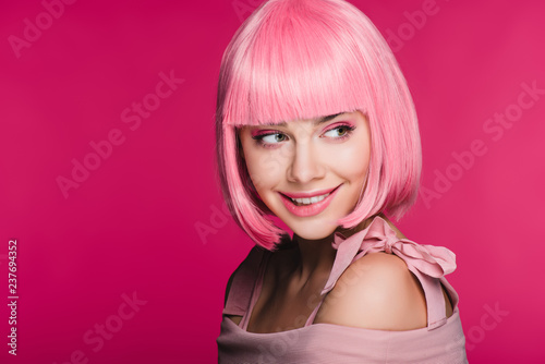 Wallpaper Mural attractive sensual girl in pink wig biting lip, isolated on pink Torontodigital.ca